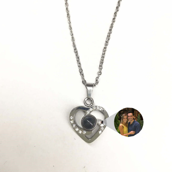 S925 silver heart-shaped pendant necklace with photo projection feature and decorative stones.