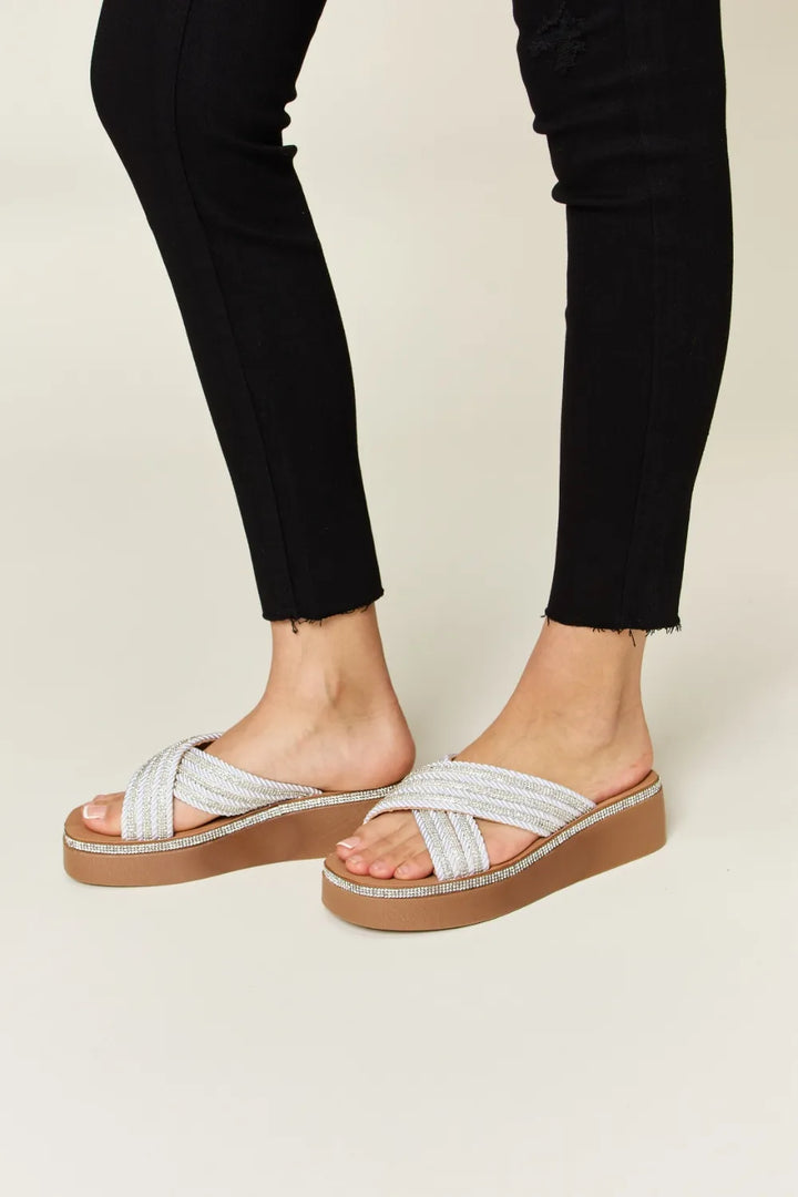 White and brown 
sandals 