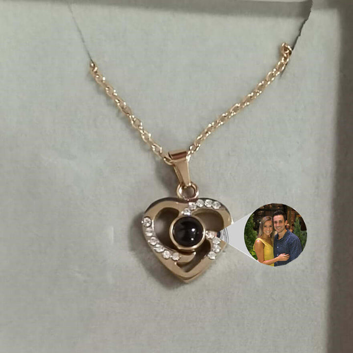 S925 silver heart-shaped pendant necklace with colorful photo projection feature and diamond accents.