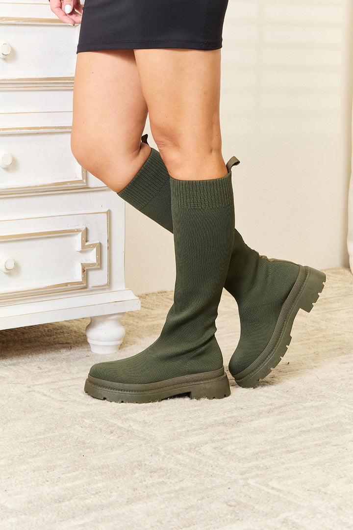 Green knee high boots 