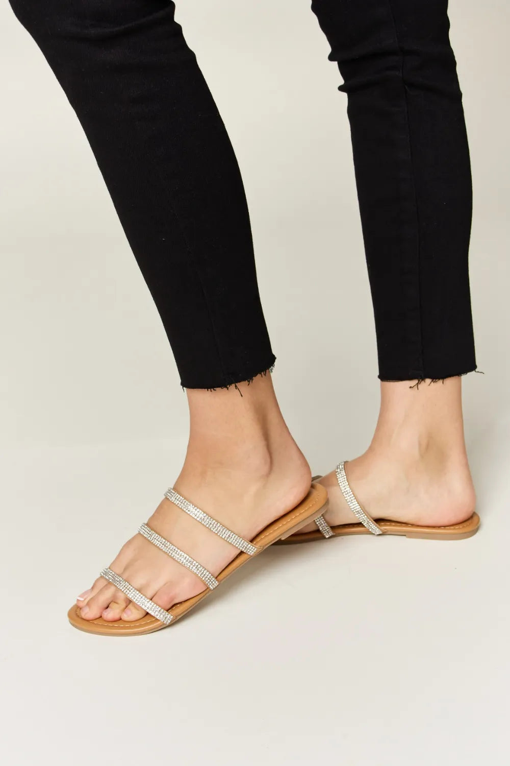 Silver strappy slippers