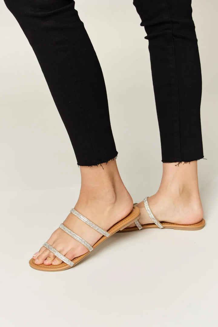 Silver strappy slippers