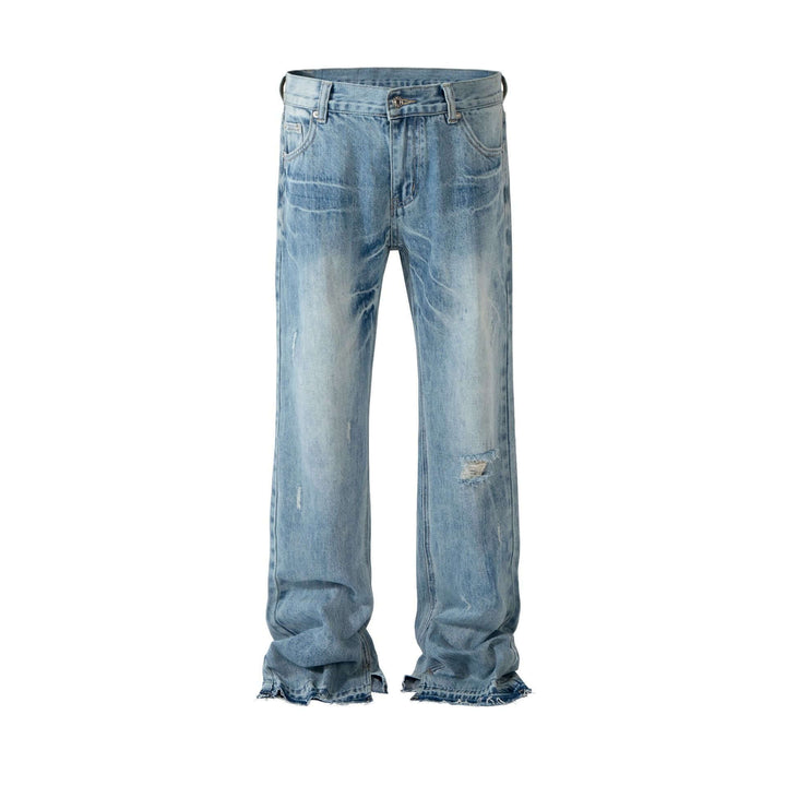 Paris style bootleg jeans featuring a washed denim finish and split hem for a trendy casual look.