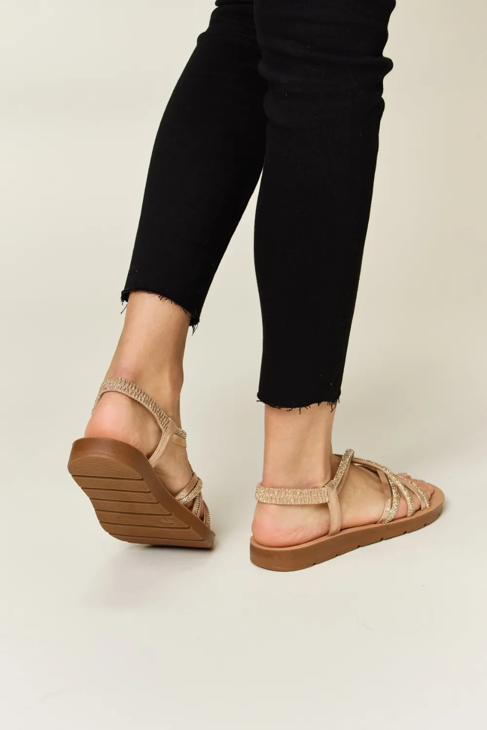 Lady  wearing brown sandals