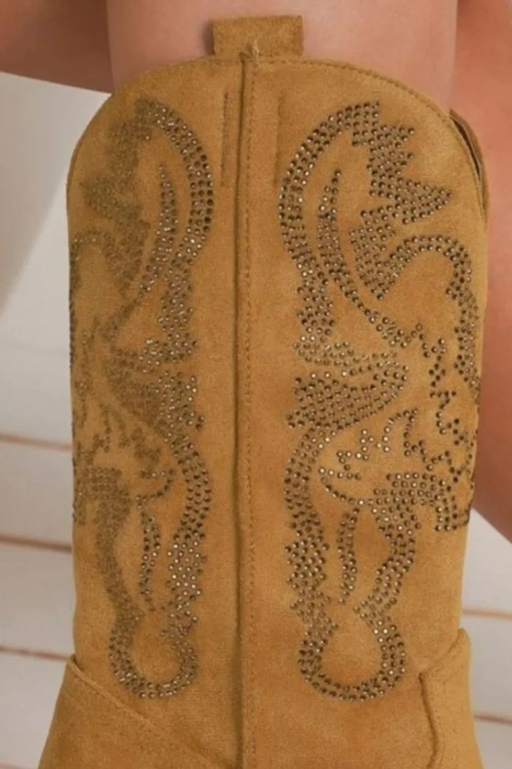 Close-up of a tan boot 