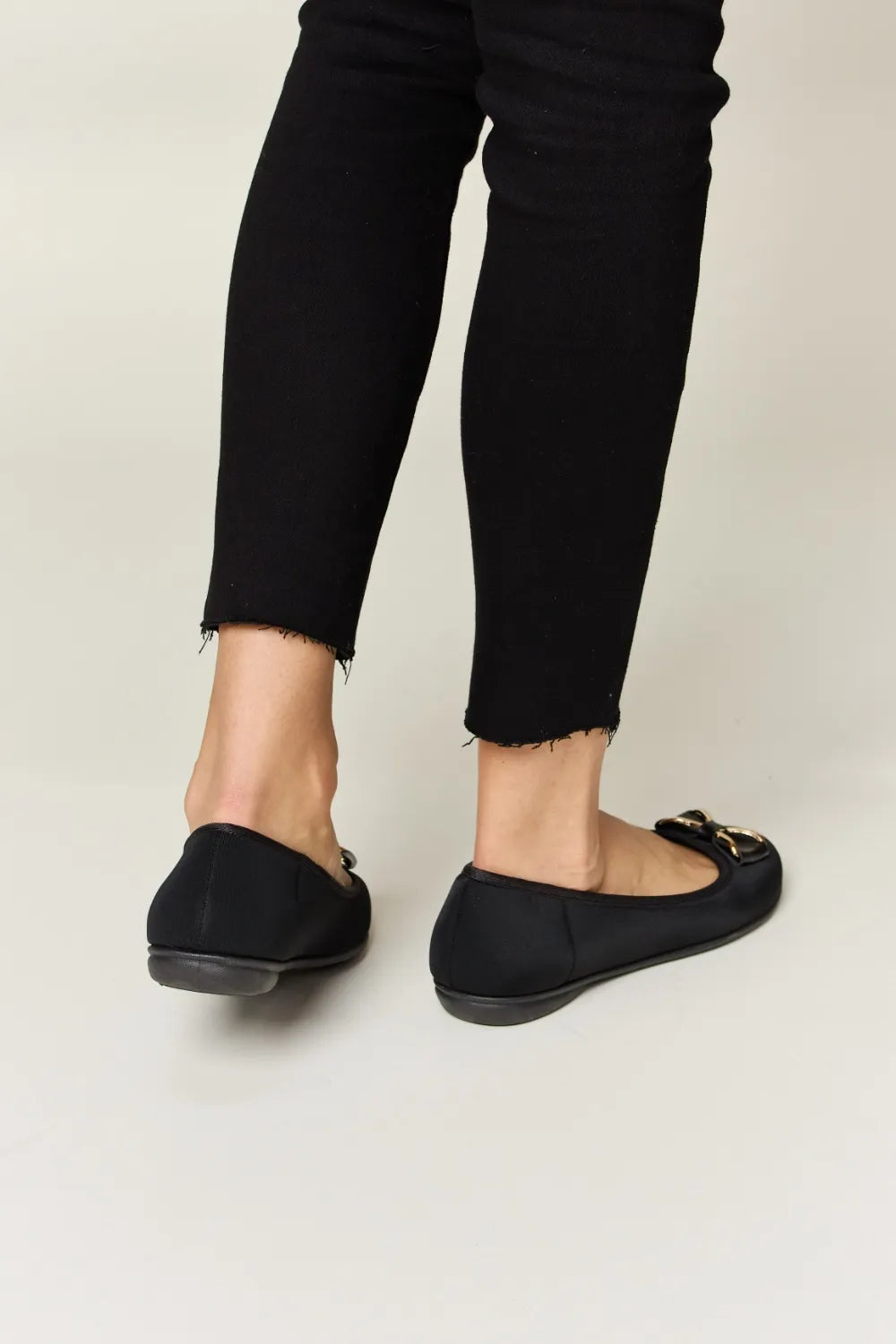 pair of black flat shoes