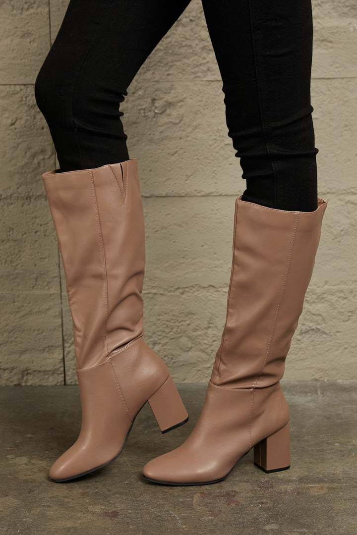 Tan knee-high boots 