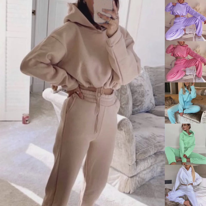 Stylish women's 2-piece jogging suit with long sleeve hoodie and comfortable pants in various colors.